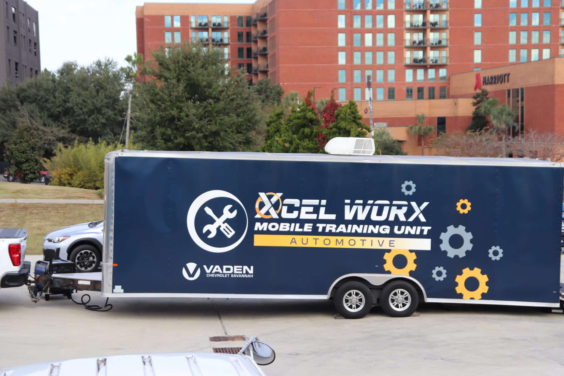 Giving Back 2 - Sprout Pay Trailer with the Xcel Strategies Inc logo